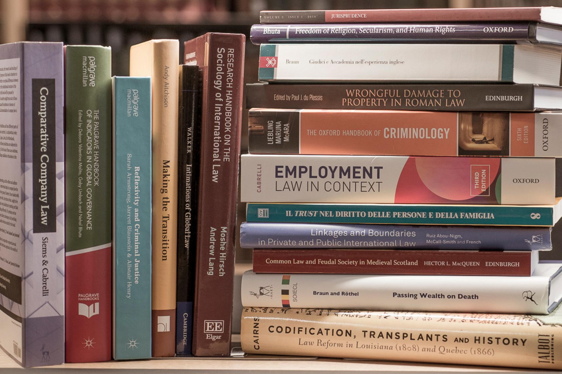 Stacks of books by Edinburgh Law School scholars